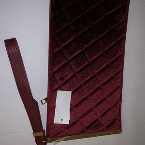 Burgundy clutch bag